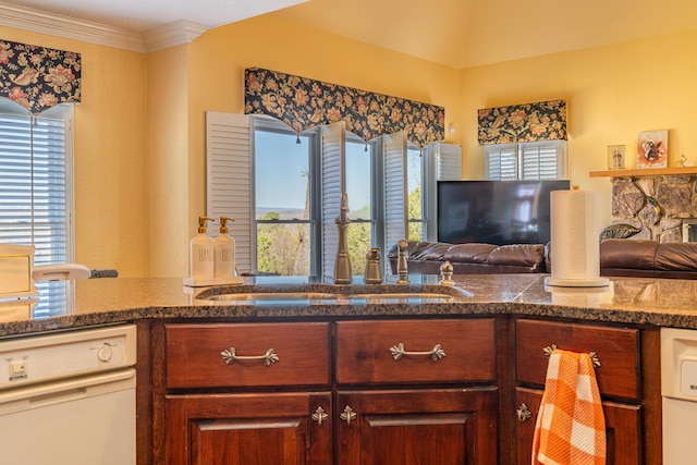 kitchen featuring ornamental molding and white dishwasher