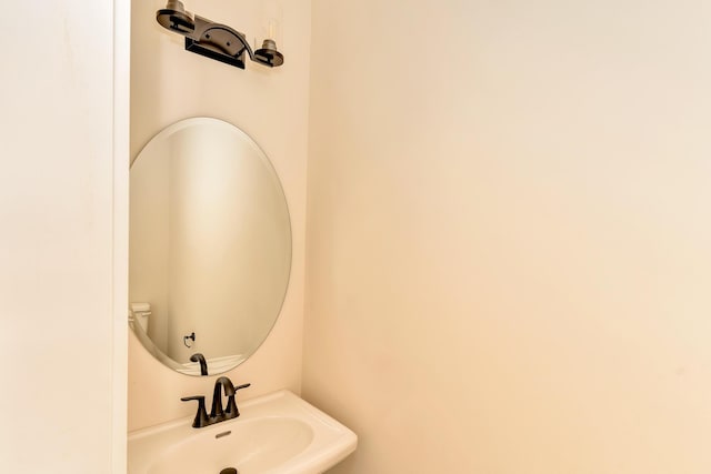 bathroom with sink and toilet