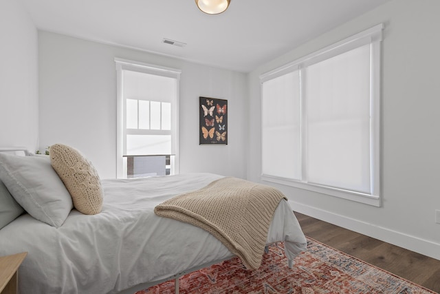 bedroom featuring hardwood / wood-style flooring