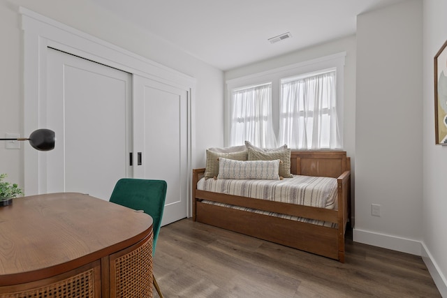 bedroom featuring hardwood / wood-style flooring