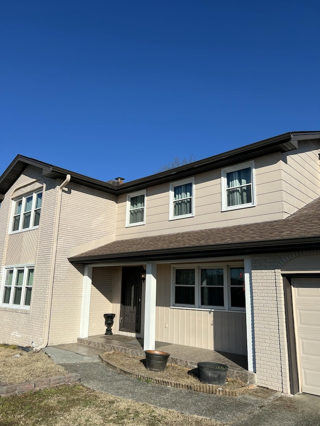 view of front of property featuring a garage