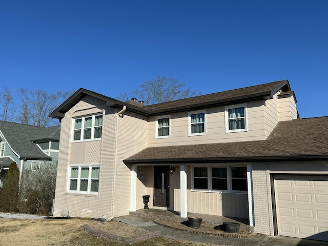 front of property with a garage