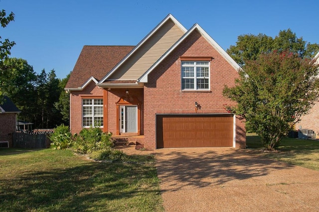 front of property featuring a garage and a front yard