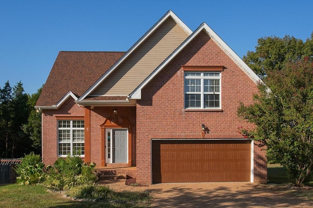 view of front of property with a garage