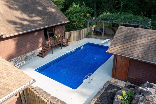 446 Jamestown Rd, Menlo, GA 30731 - view of swimming pool with a wooden deck, a pergola, an outdoor structure, and a diving board