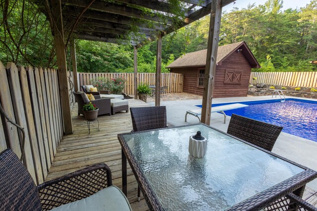 446 Jamestown Rd, Menlo, GA 30731 - wooden terrace with a fenced in pool, a shed, and a pergola