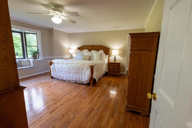 446 Jamestown Rd, Menlo, GA 30731 - bedroom with ceiling fan, ornamental molding, wood-type flooring, and a textured ceiling