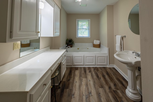 446 Jamestown Rd, Menlo, GA 30731 - bathroom featuring hardwood / wood-style flooring and a washtub