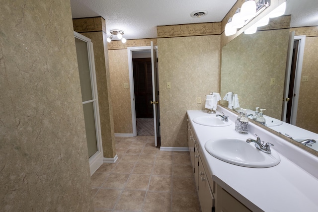 446 Jamestown Rd, Menlo, GA 30731 - bathroom with vanity, a shower with door, tile patterned flooring, and a textured ceiling