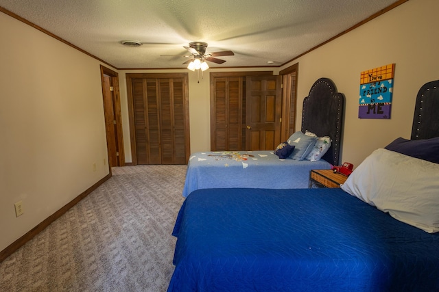 446 Jamestown Rd, Menlo, GA 30731 - carpeted bedroom with crown molding, ceiling fan, multiple closets, and a textured ceiling