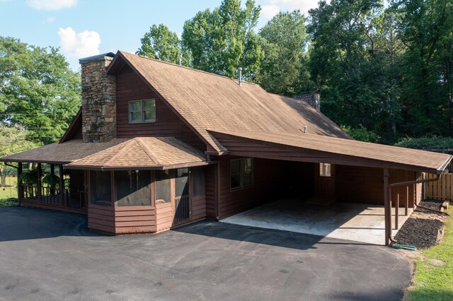 446 Jamestown Rd, Menlo, GA 30731 - view of front facade with a sunroom and a carport