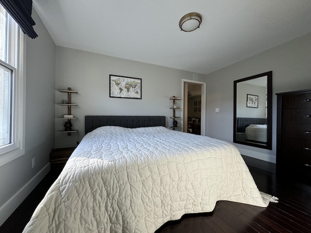 bedroom featuring dark hardwood / wood-style floors