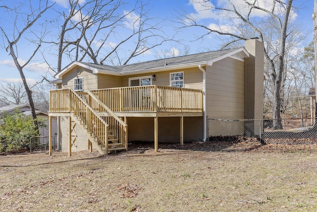 back of property featuring a deck