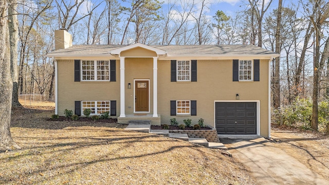 bi-level home with a garage