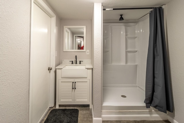 bathroom featuring vanity and a shower with curtain