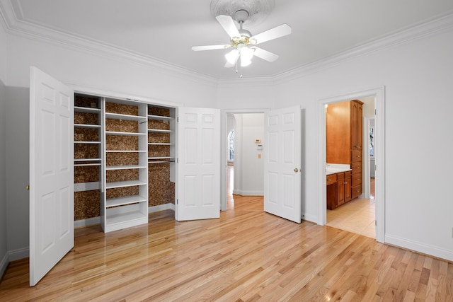 unfurnished bedroom featuring baseboards, a ceiling fan, connected bathroom, ornamental molding, and light wood-style floors