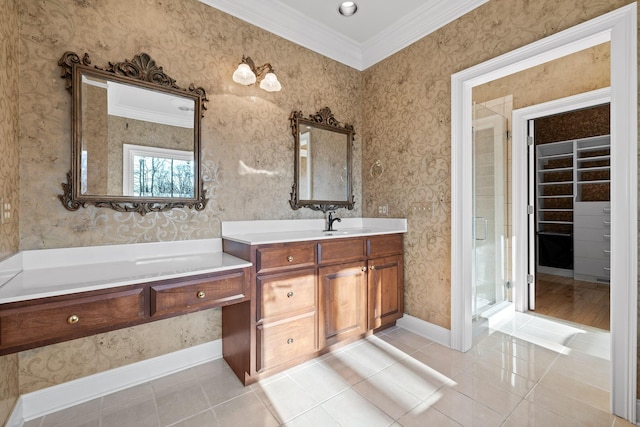 bathroom featuring ornamental molding, tile patterned flooring, vanity, and wallpapered walls