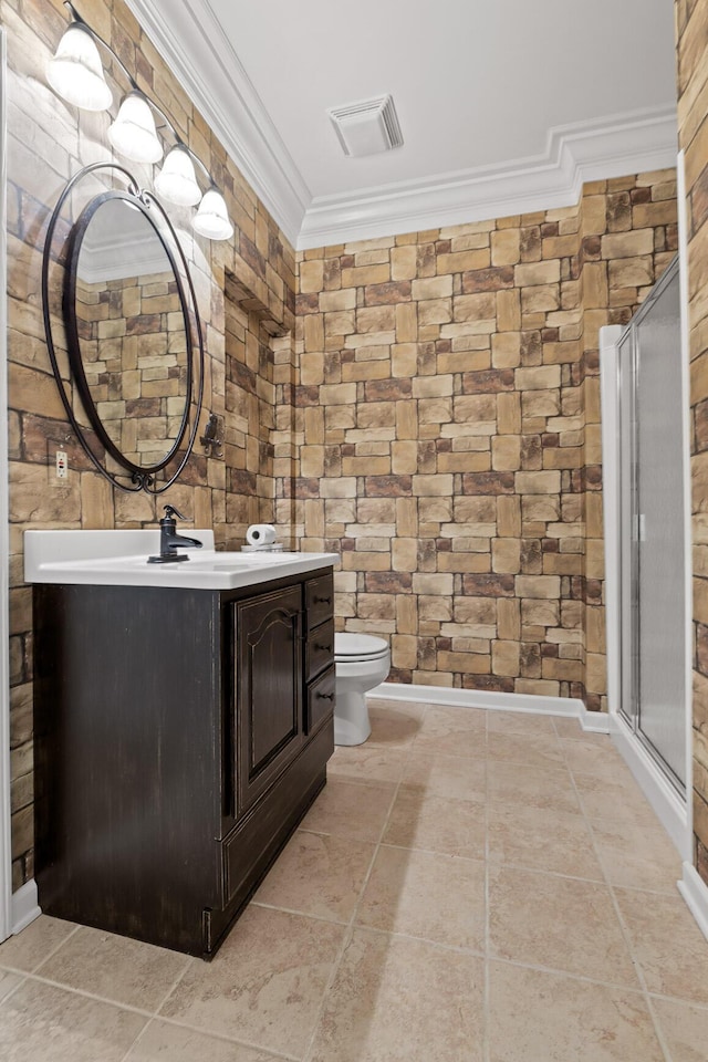 bathroom with tile patterned flooring, toilet, vanity, visible vents, and ornamental molding