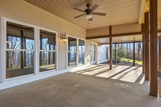 view of patio with a ceiling fan and fence