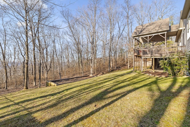 view of yard with a deck