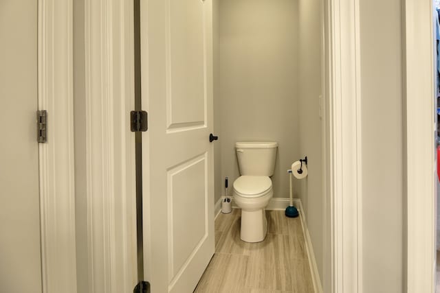 bathroom featuring tile patterned floors and toilet