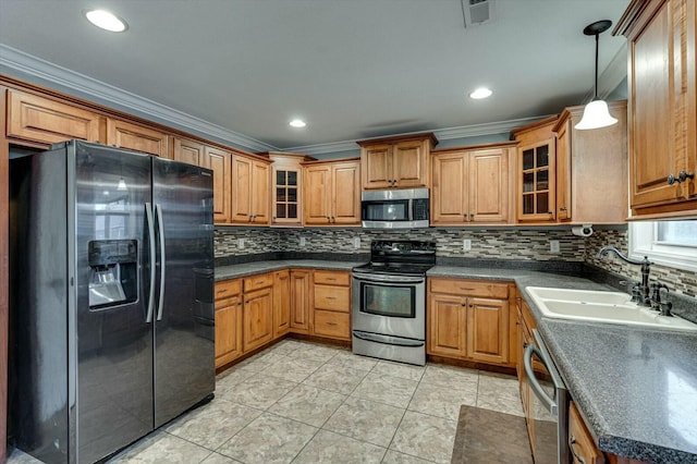 kitchen with pendant lighting, tasteful backsplash, sink, stainless steel appliances, and crown molding