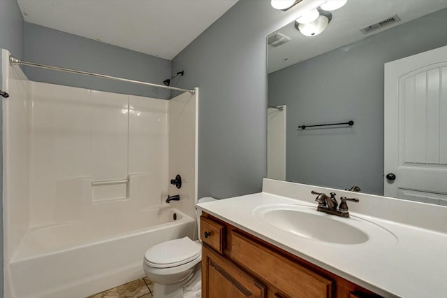 full bathroom featuring vanity, toilet, tub / shower combination, and tile patterned flooring