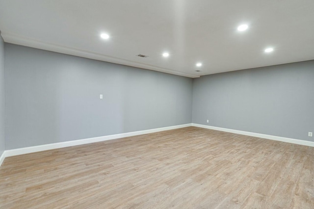 basement featuring light hardwood / wood-style flooring