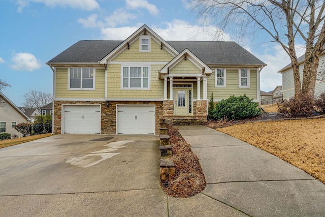 view of front of property with a garage