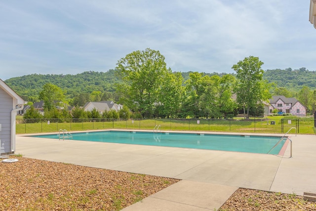 view of pool featuring a patio area