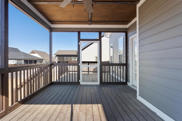 wooden deck featuring ceiling fan