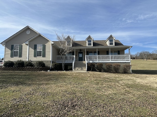 view of front of home featuring a front yard and covered porch