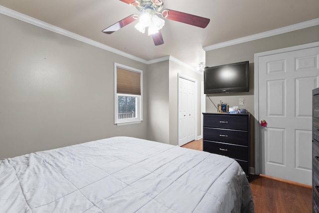 bedroom with ornamental molding, wood-type flooring, and ceiling fan