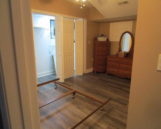 bedroom with hardwood / wood-style floors