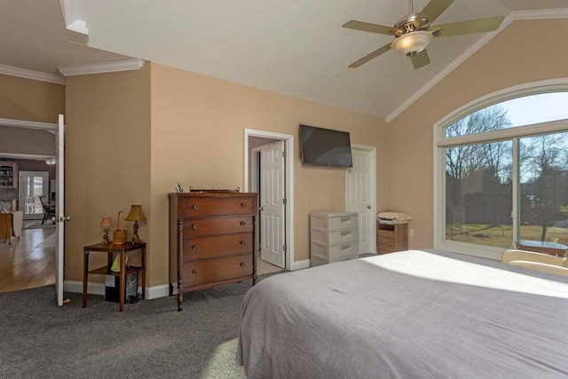 carpeted bedroom featuring vaulted ceiling, ornamental molding, access to exterior, and ceiling fan