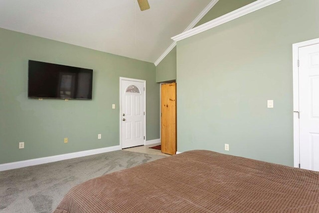 unfurnished bedroom featuring crown molding, ceiling fan, high vaulted ceiling, and light carpet