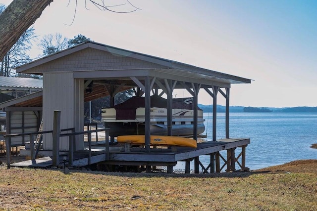 view of dock with a water view