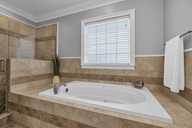 bathroom with crown molding and shower with separate bathtub