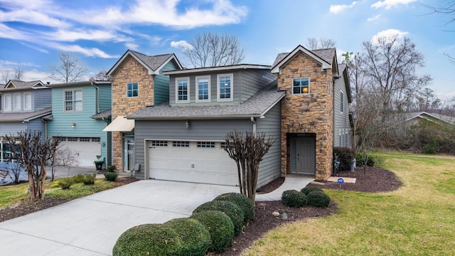 view of front facade with a garage and a front yard