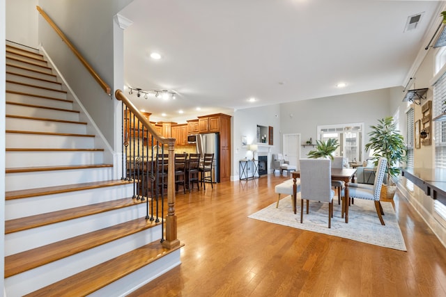 dining space featuring light hardwood / wood-style floors