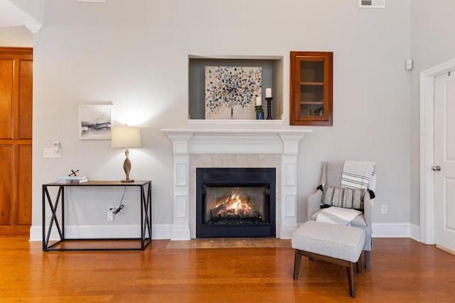 sitting room featuring hardwood / wood-style floors