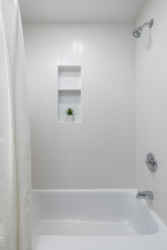 full bath featuring shower / bath combo