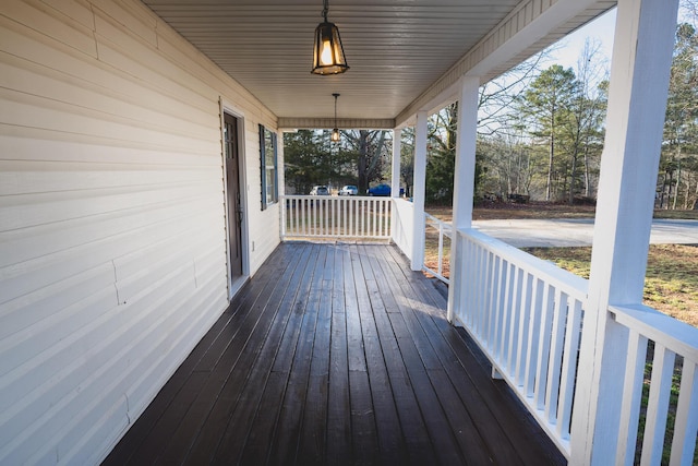 wooden terrace featuring a porch