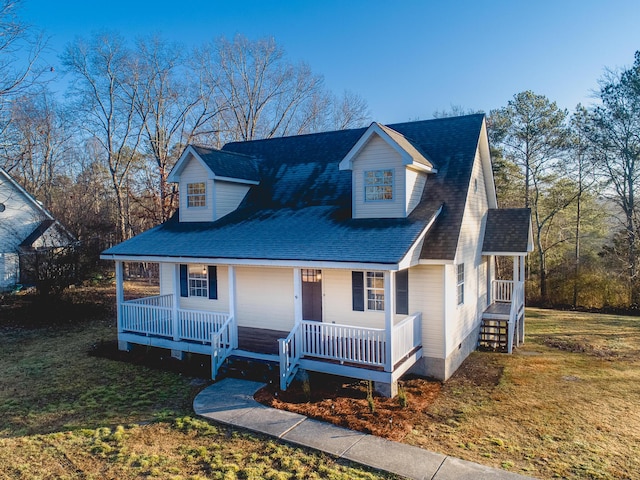 view of front of house featuring a porch and a front lawn