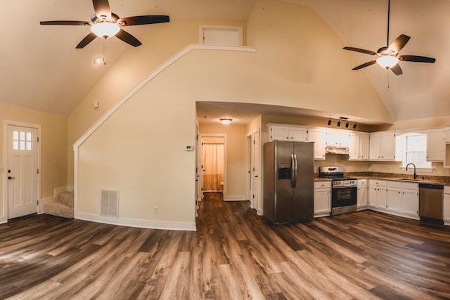 kitchen with white cabinetry, appliances with stainless steel finishes, dark hardwood / wood-style flooring, and sink