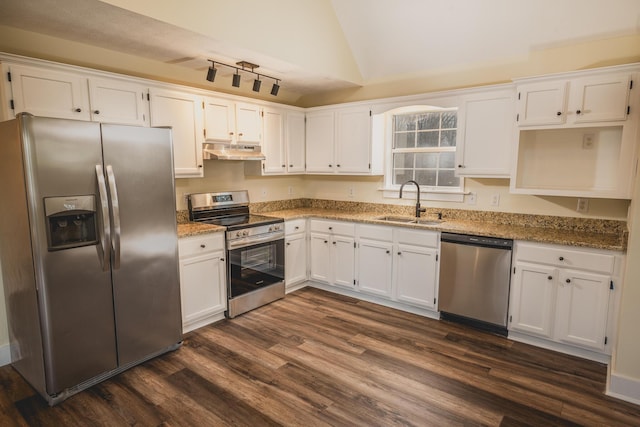 kitchen featuring white cabinetry, appliances with stainless steel finishes, stone countertops, and sink