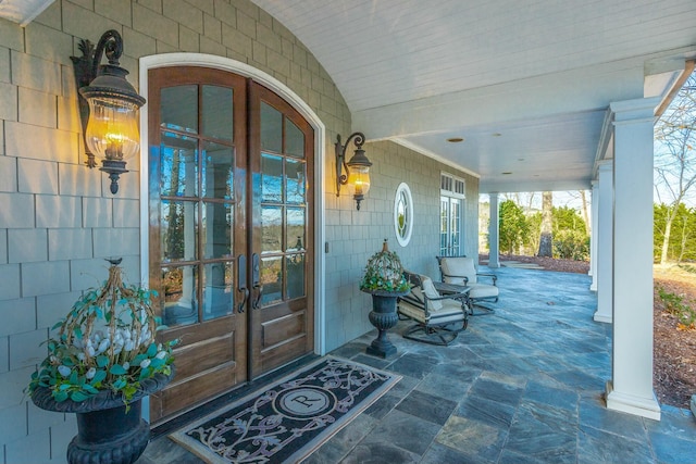 property entrance featuring french doors