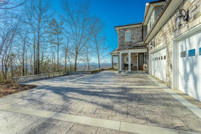 view of patio with a garage