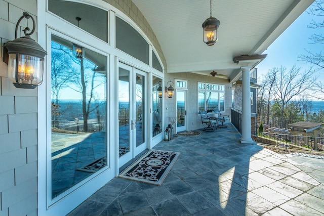 view of patio / terrace featuring french doors and ceiling fan