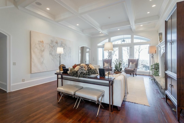 living room featuring dark wood-type flooring, coffered ceiling, beam ceiling, and french doors